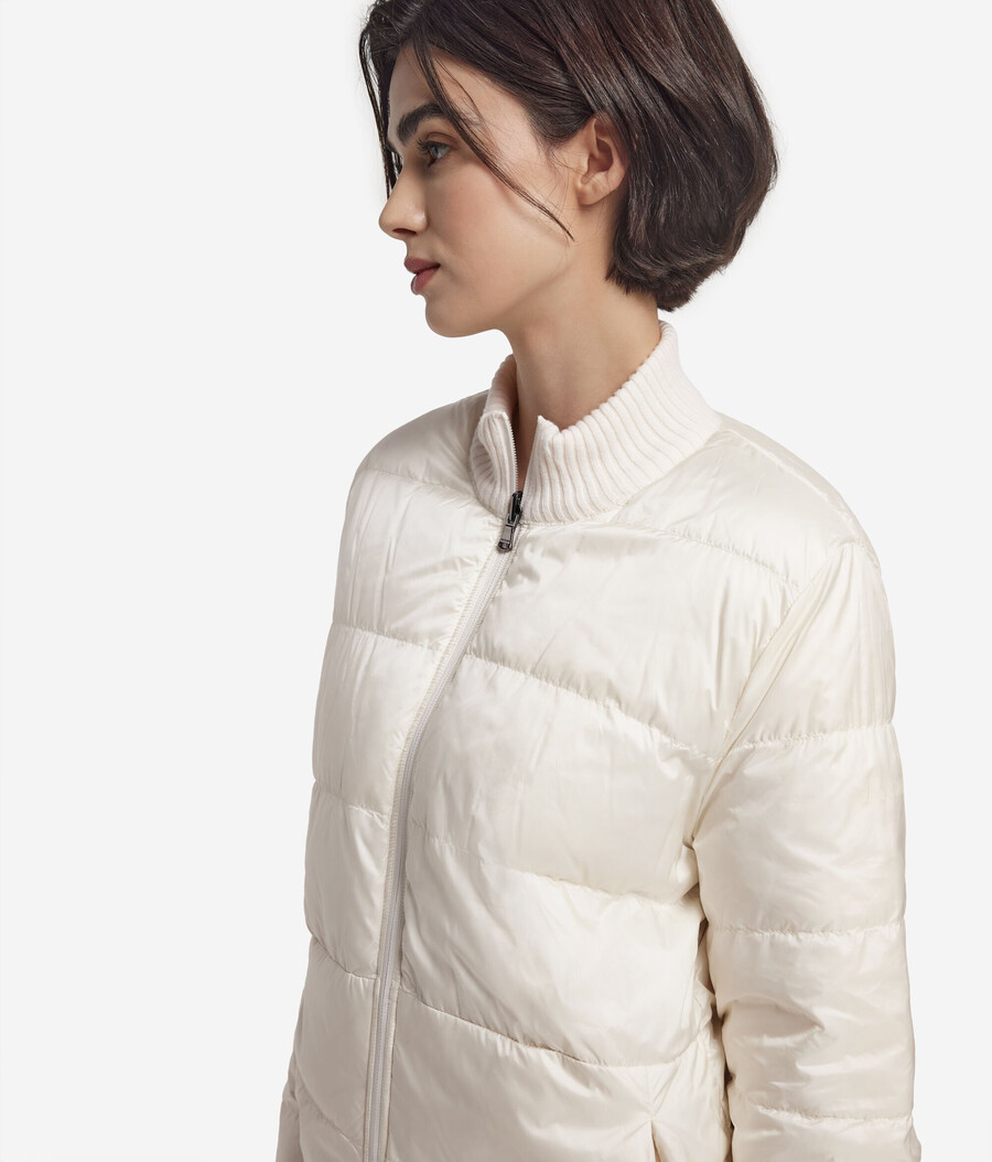 wendbare daunenjacke mit zopfmuster aus kaschmir und funktionsgewebe.