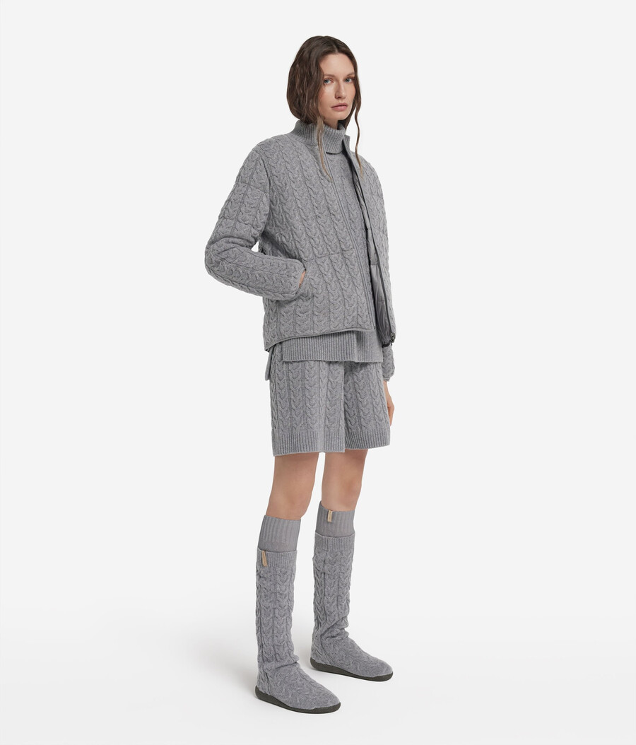 wendbare daunenjacke mit zopfmuster aus kaschmir und funktionsgewebe.